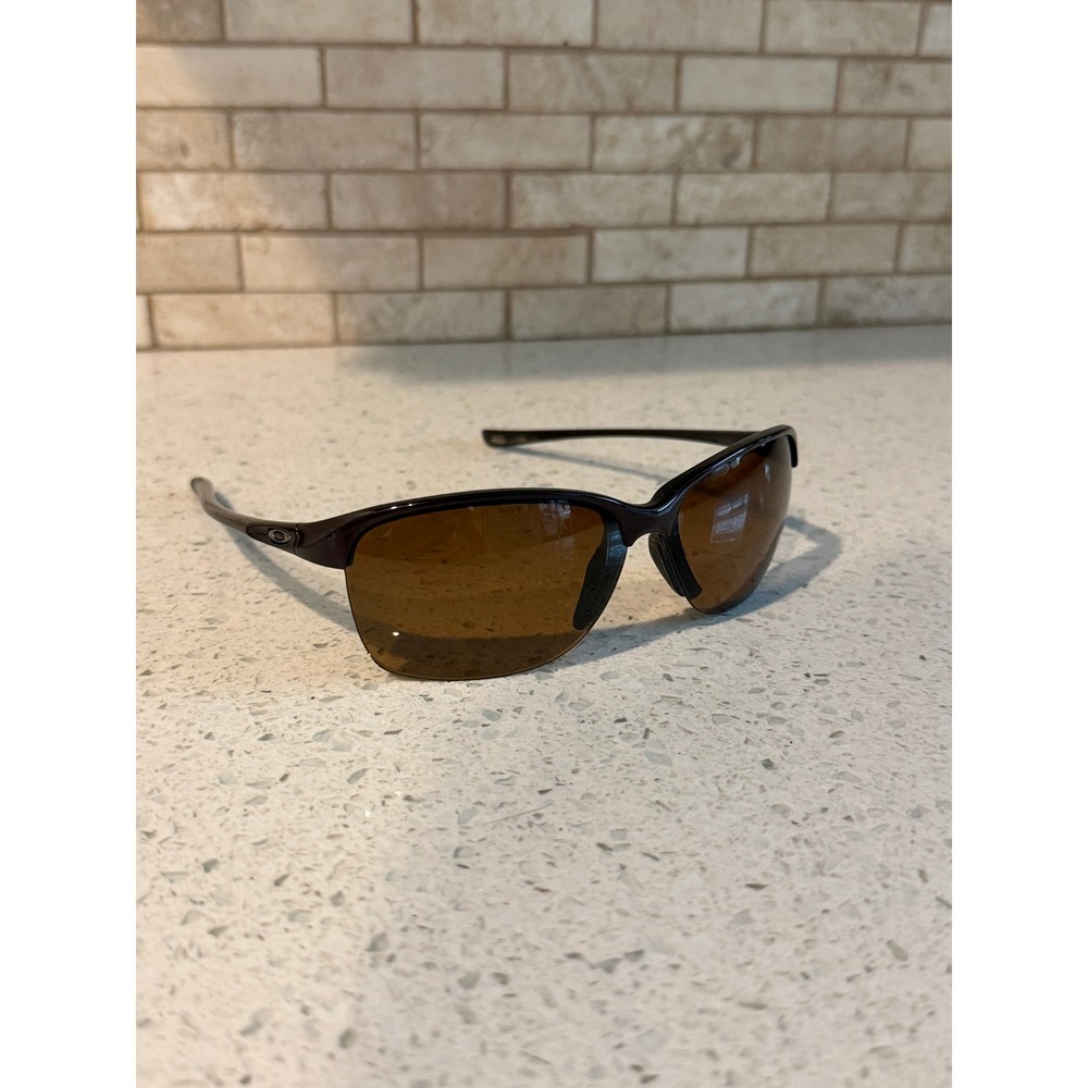 Oakley UNSTOPPABLE Raspberry Spritzer POLARIZED Brown Gradient Sunglass 9191